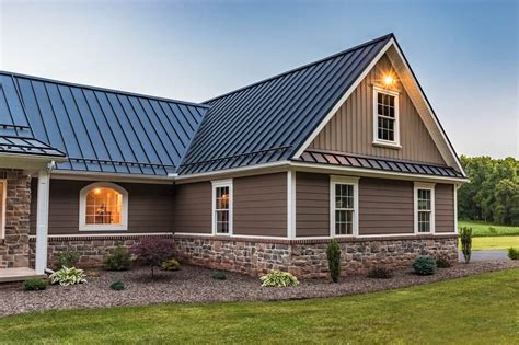 small brown house with metal roof|homes with brown metal roofs.